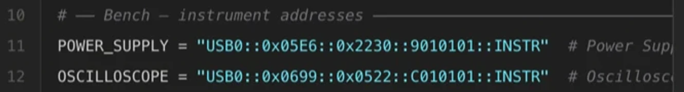 A block of generated Python headed with the comment Bench, instrument addresses, defining POWER_SUPPLY as a USB VISA resource string and OSCILLOSCOPE as another, each with a trailing comment naming the instrument.